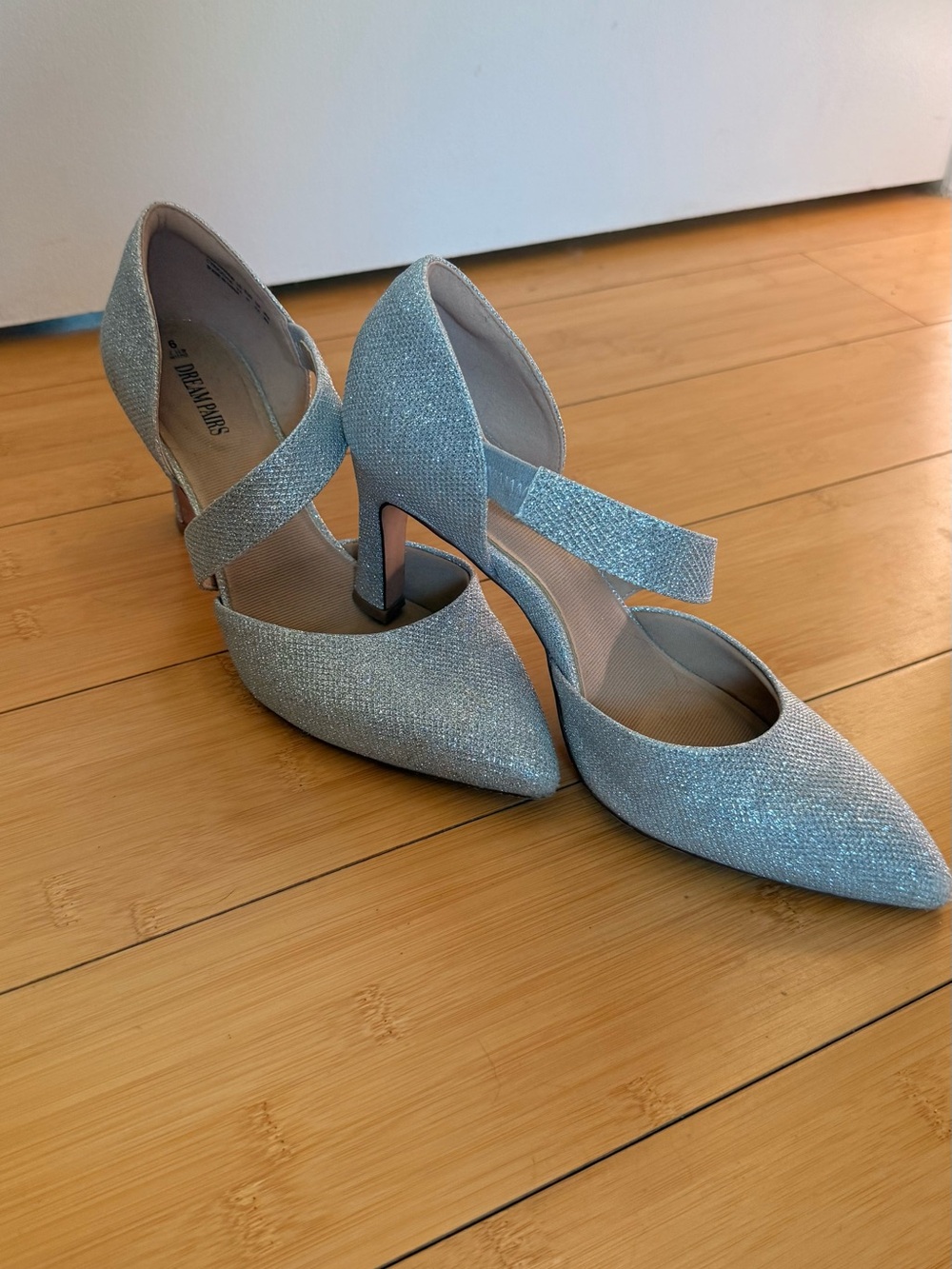 DREAM PAIRS closed toe pointed silver glitter heels.